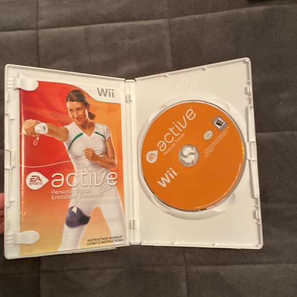Wii active personal trainer program. Bought new a few years ago but never used. - Picture 3 of 3